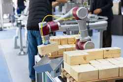 Cobot Picking Up Wood Blocks