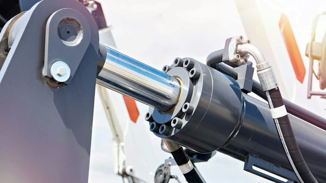 Close up on a black hydraulic cylinder