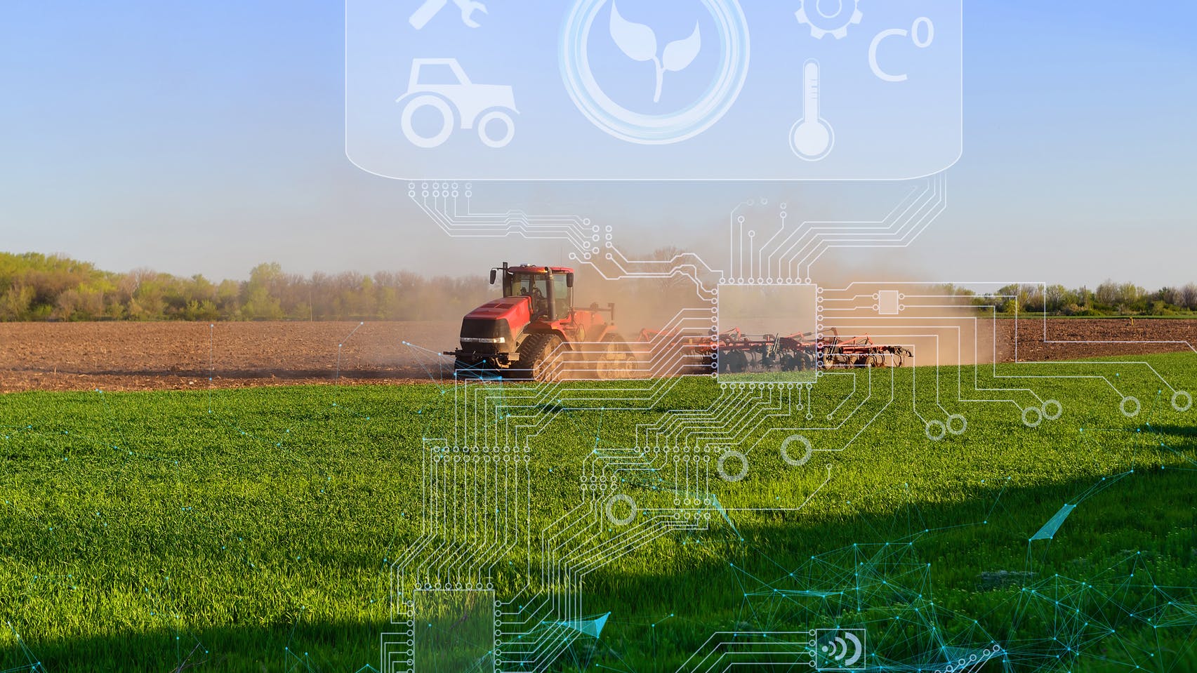 Tractor working in farm field with graphics overlaid to illustrate concept of digital technologies