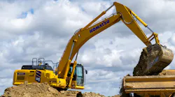 Komatsu PC365LC-11 Excavator Loading Dirt into Truck