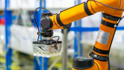 Orange Cobot with Vacuum Gripper
