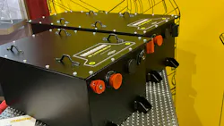 Two black lithium battery packs next to each other on display at iVT Expo