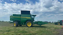 John Deere Combine in a Field