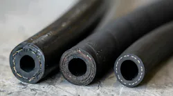 Hydraulic and Industrial hoses lined up in a row