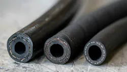 Hydraulic and Industrial hoses lined up in a row
