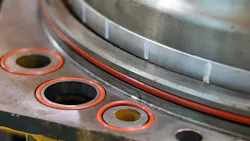 Orange O-Rings Installed in Machinery