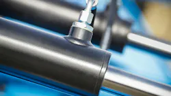 Close up on a black hydraulic cylinder