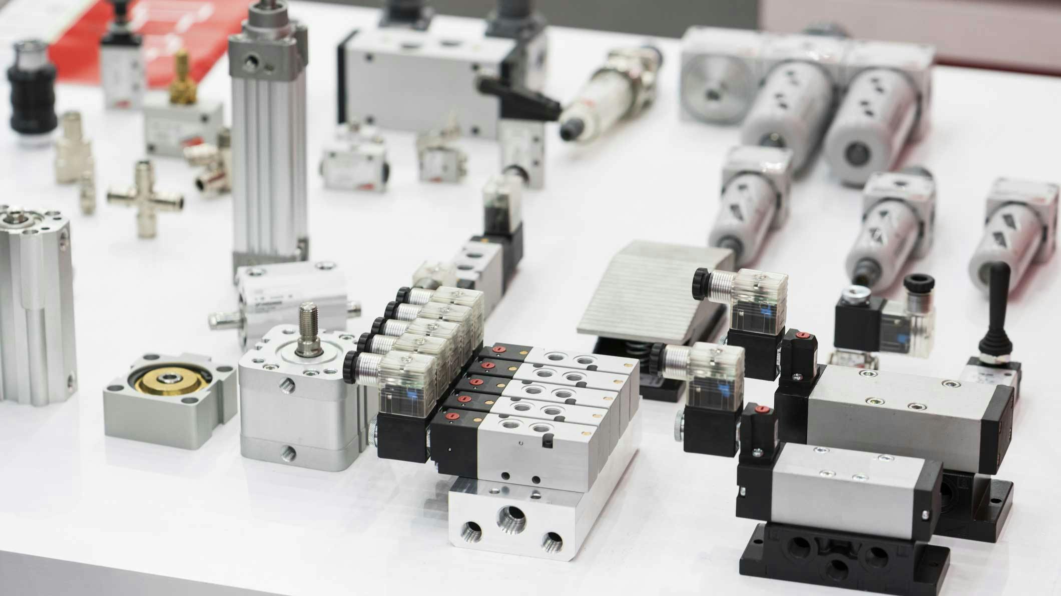 Display of various fluid power components including valves and cylinders